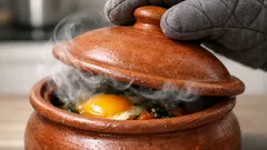 Cozy clay pot turkey with leeks, mushrooms, and a baked egg on top