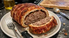 Pancetta-Wrapped Meatloaf Baked in a Bread Loaf (Italian Polpettone in Crosta)